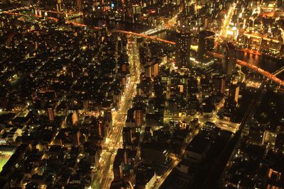 High angle view of illuminated city at night