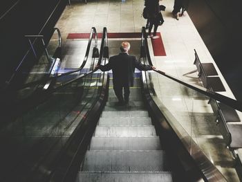 Man walking on staircase