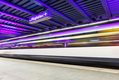 Blurred motion of train at subway station