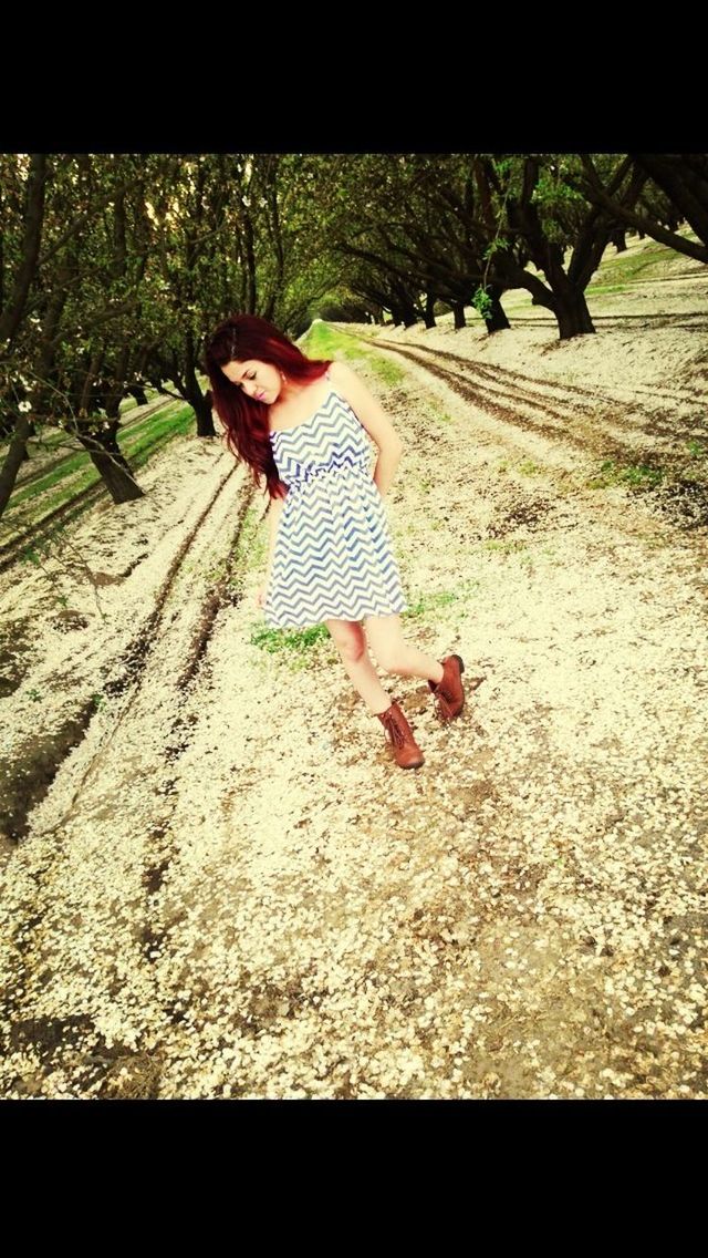 lifestyles, full length, leisure activity, tree, casual clothing, transfer print, childhood, person, auto post production filter, day, sunlight, barefoot, outdoors, enjoyment, carefree, side view, jumping