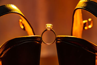 Close-up of wedding rings on table