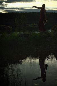 Woman with horse in water