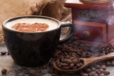 Close-up of coffee cup on table