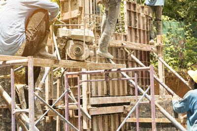 Workers are building in the construction area.