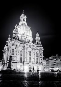 Low angle view of historical building at night