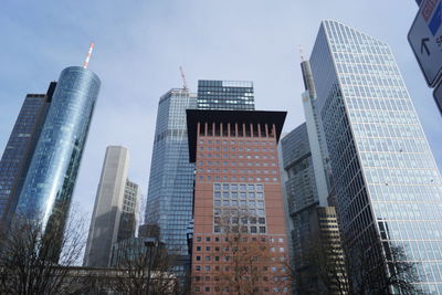 Low angle view of skyscrapers against sky