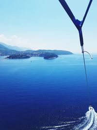 Scenic view of sea against blue sky