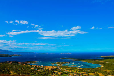 Scenic view of sea against blue sky