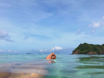 Scenic view of sea against sky from water