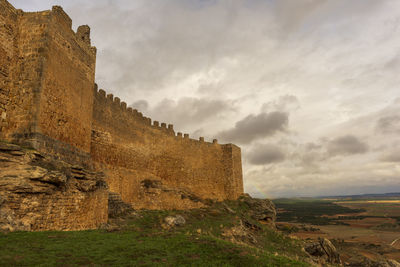 View of fort against cloudy sky