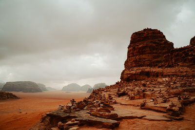 Rock formations on mountain against sky