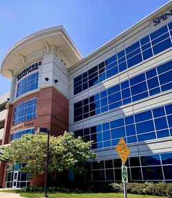 Low angle view of building against blue sky