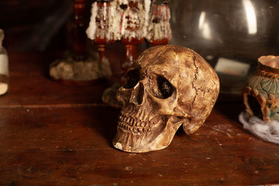 Close-up of human skull on table