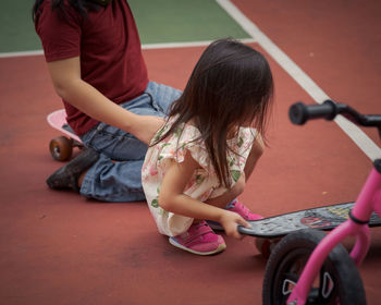 Girl and boy with skateboards