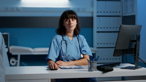 Young businesswoman working at office