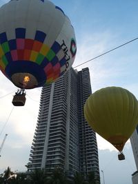 Low angle view of hot air balloon flying in sky