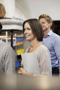 Business people visiting commercial kitchen