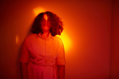 Young woman portrait, on colorful background