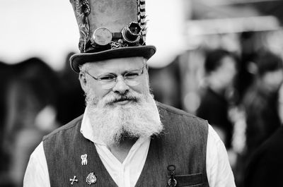 Portrait of senior man standing outdoors