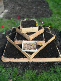 High angle view of wooden structure on field