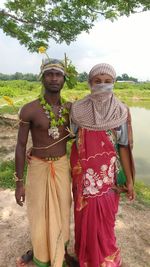 Portrait of a smiling woman standing outdoors