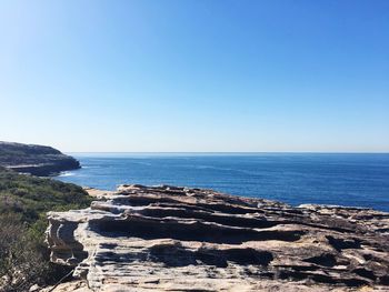 Scenic view of sea against clear sky