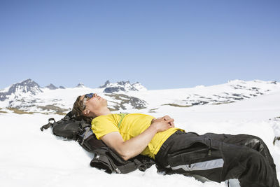 Hiker resting in mountains