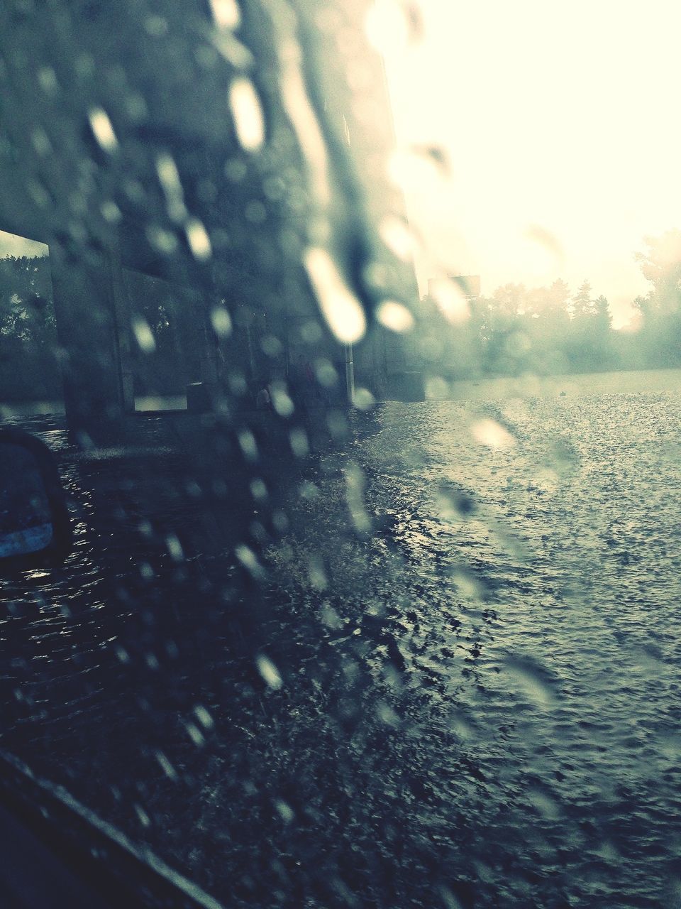 transportation, wet, car, mode of transport, water, land vehicle, rain, glass - material, drop, transparent, window, season, weather, road, street, vehicle interior, raindrop, reflection, windshield, close-up