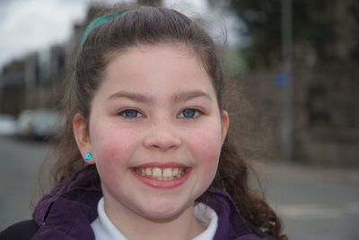 Close-up portrait of a smiling girl