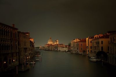 View of buildings in city against clear sky