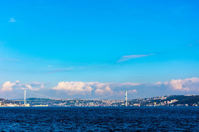 Scenic view of bay bridge against sky