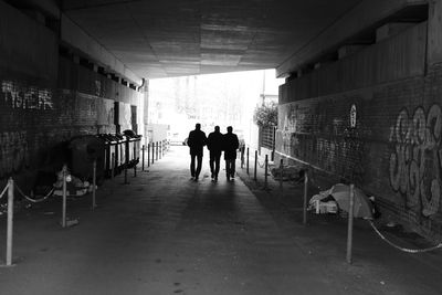 People standing in corridor