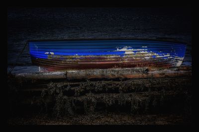 Boats moored in sea