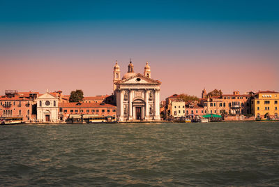 View of buildings at waterfront