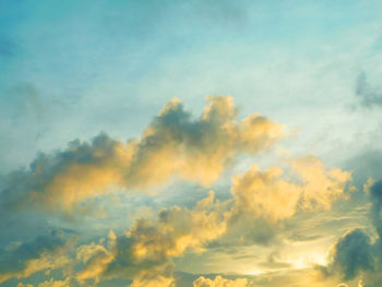 Low angle view of dramatic sky during sunset