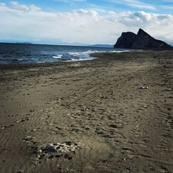 Scenic view of beach against sky