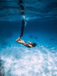 Man swimming in sea