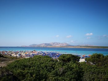 Scenic view of sea against blue sky