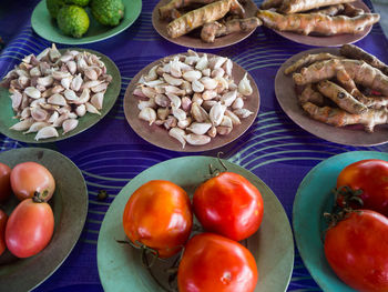 High angle view of fruits in plate on table