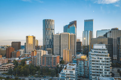 Modern buildings in city against sky