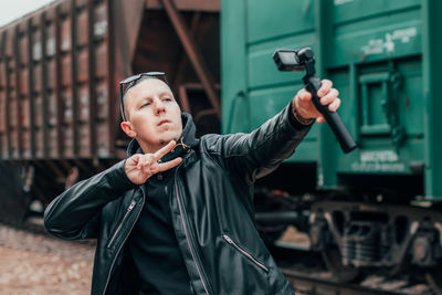 Portrait of boy photographing