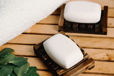 Close-up of soap on table with towel