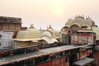 View of buildings against sky during sunset