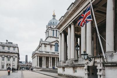 Union jack flag on university of greenwich building, london, uk.