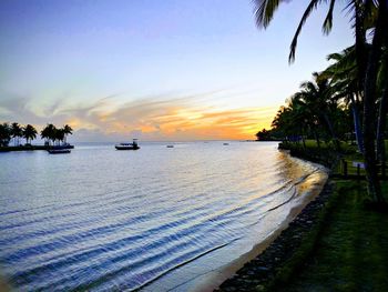 Scenic view of sea against sky at sunset