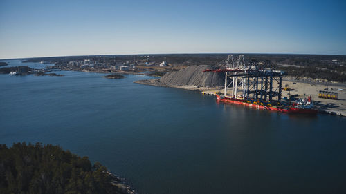 High angle view of harbor against clear blue sky