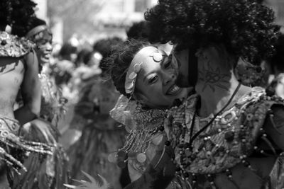 Close-up of people in traditional clothing outdoors