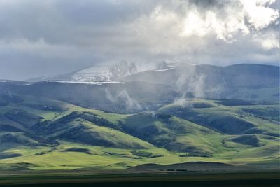 Scenic view of mountains against sky