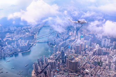 High angle view of buildings in city against sky