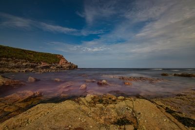 Scenic view of beach against sky